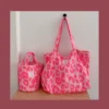 A pink reusable bag that complements your lifestyle and values.