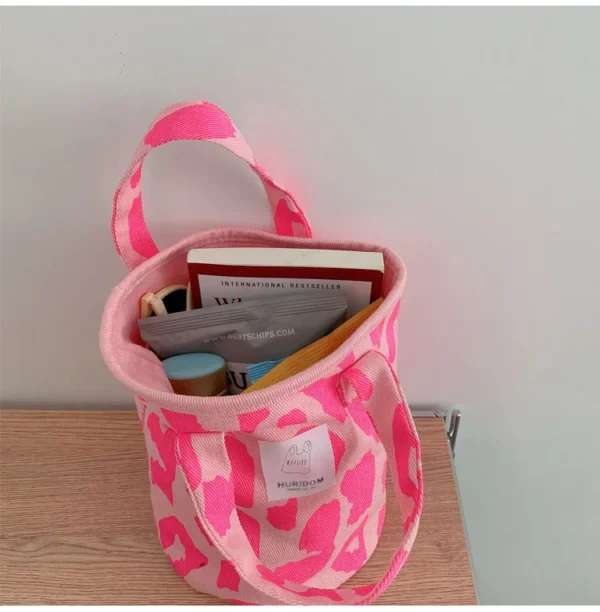 Upgrade your grocery game with our chic pink reusable bag.