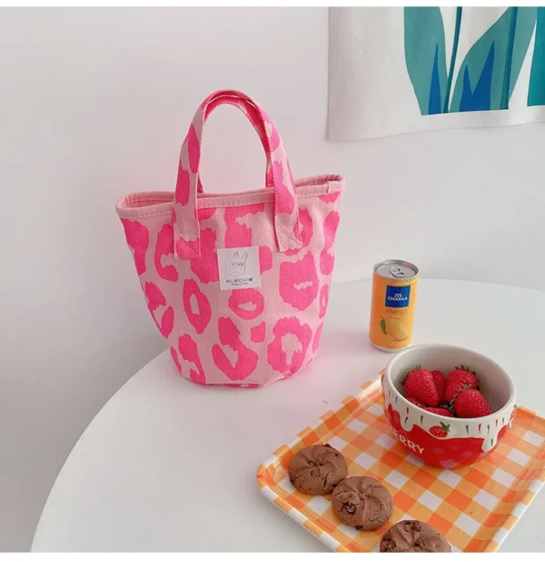Lead the way in eco-fashion with our pink reusable bag.