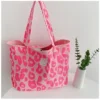 Sustainable shopping has never looked so good: pink reusable bag.