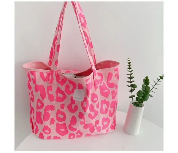 Sustainable shopping has never looked so good: pink reusable bag.