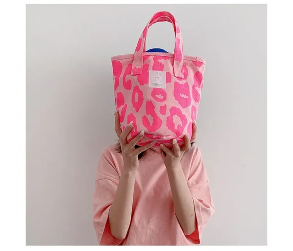 A pink reusable bag: where durability meets playful design.