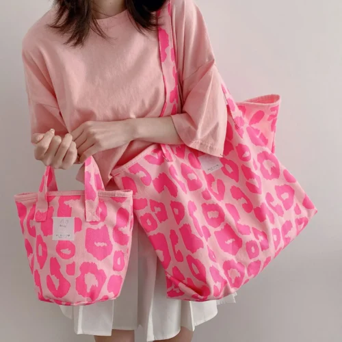 Navigate your day with ease and style with our pink reusable bag.