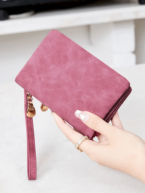 Keep your essentials secure with our Minimalist Zipper Wallet.