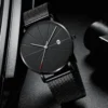 Define your everyday elegance with a black minimalist watch.