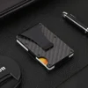 Stay sleek, stay secure with our carbon fiber minimalist wallet.